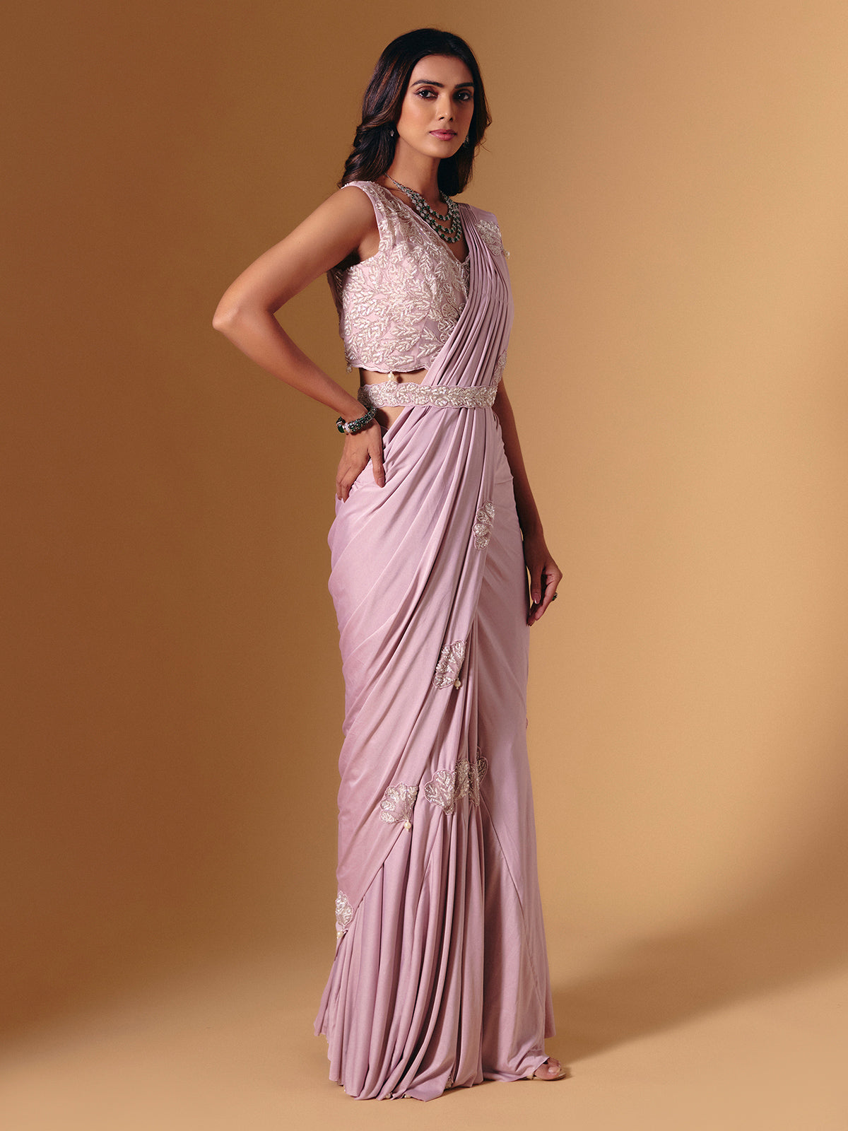 Light pink lycra saree with shimmering pearl accents