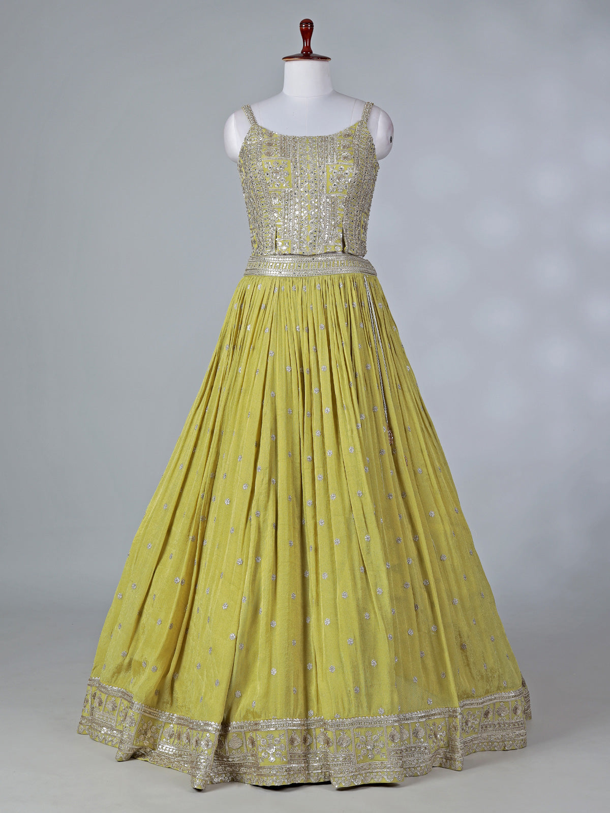 Lime green silk lehenga choli with mirror work