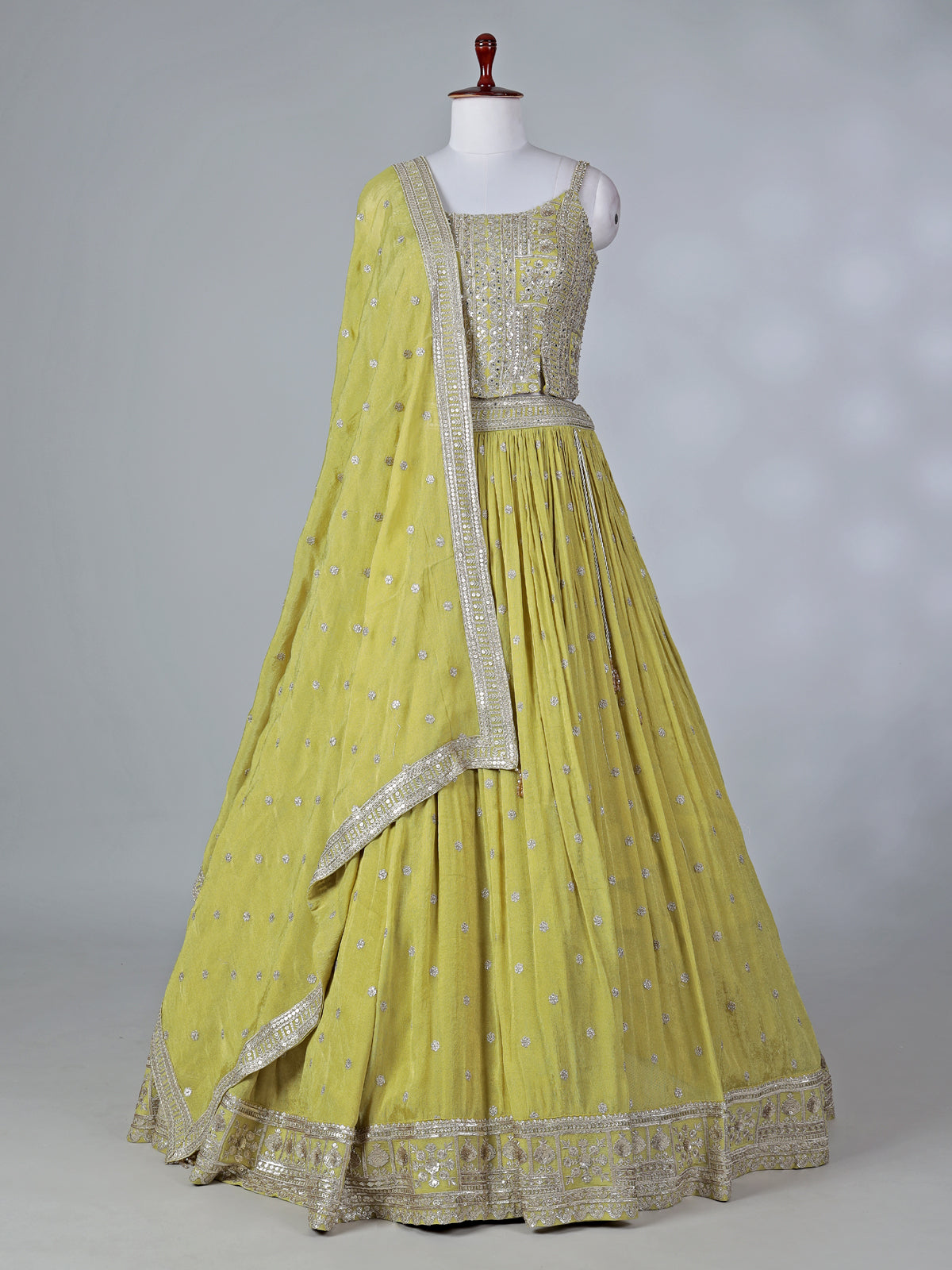Lime green silk lehenga choli with mirror work