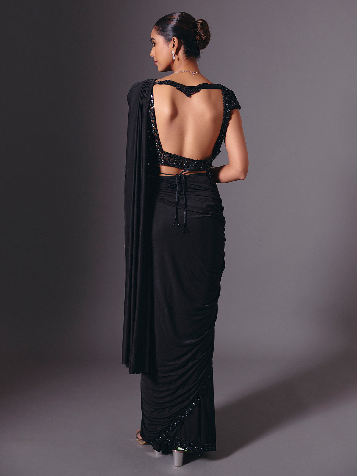 Luxe black lycra saree with diamond and cutdana accents