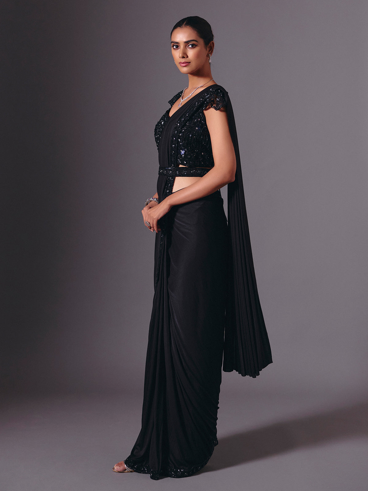 Luxe black lycra saree with diamond and cutdana accents