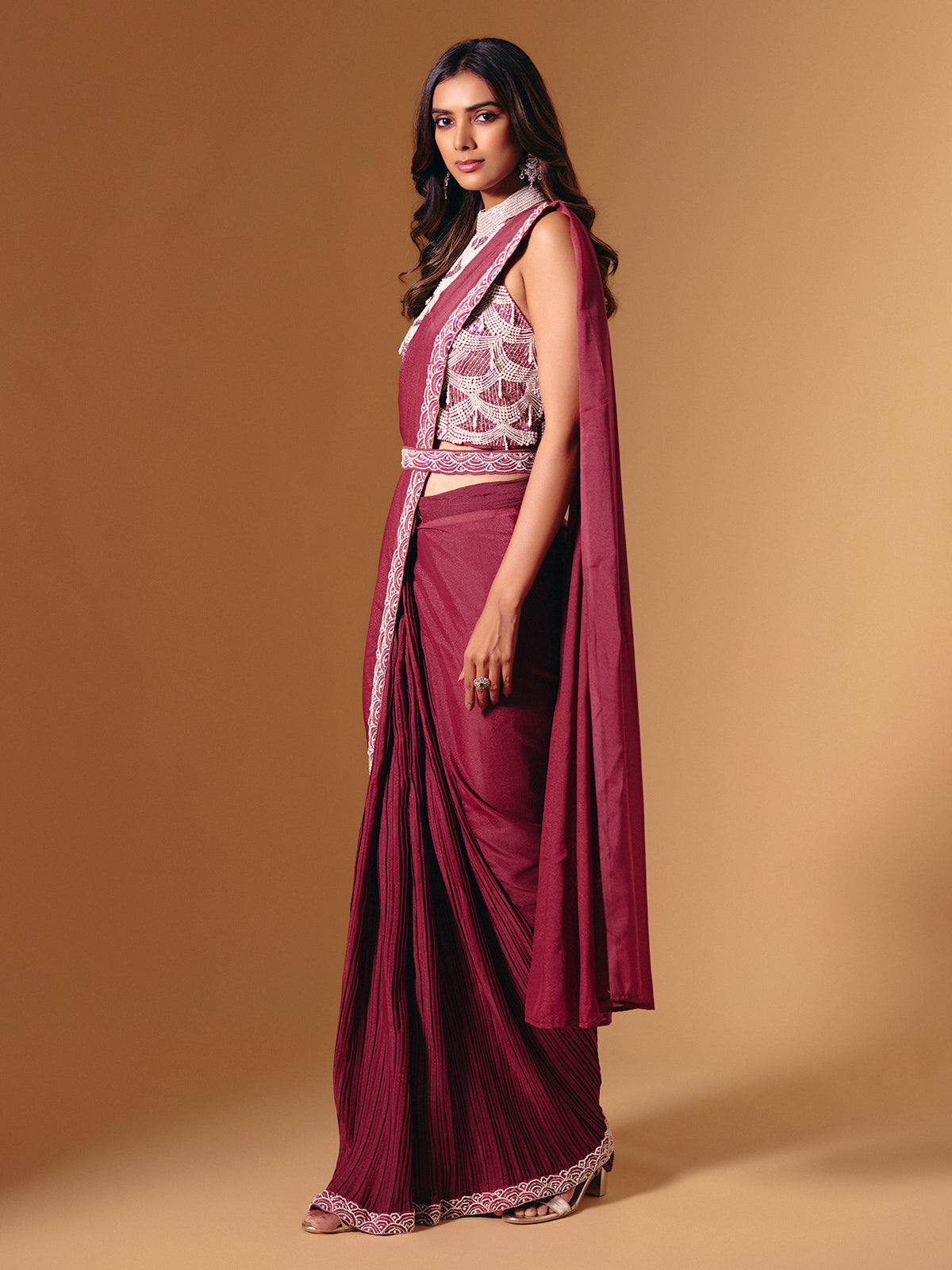 Maroon cruss lycra saree with sequins and pearl highlights