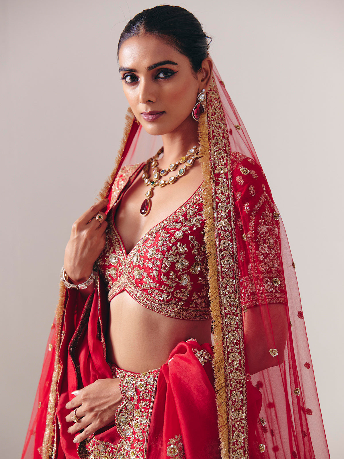Maroon silk bridal lehenga choli with resham detailing