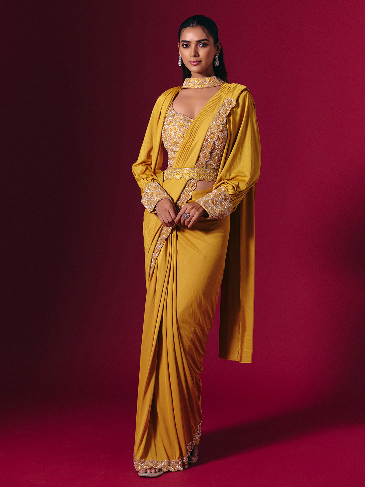 Mustard satin saree with elegant pearl and cutdana work