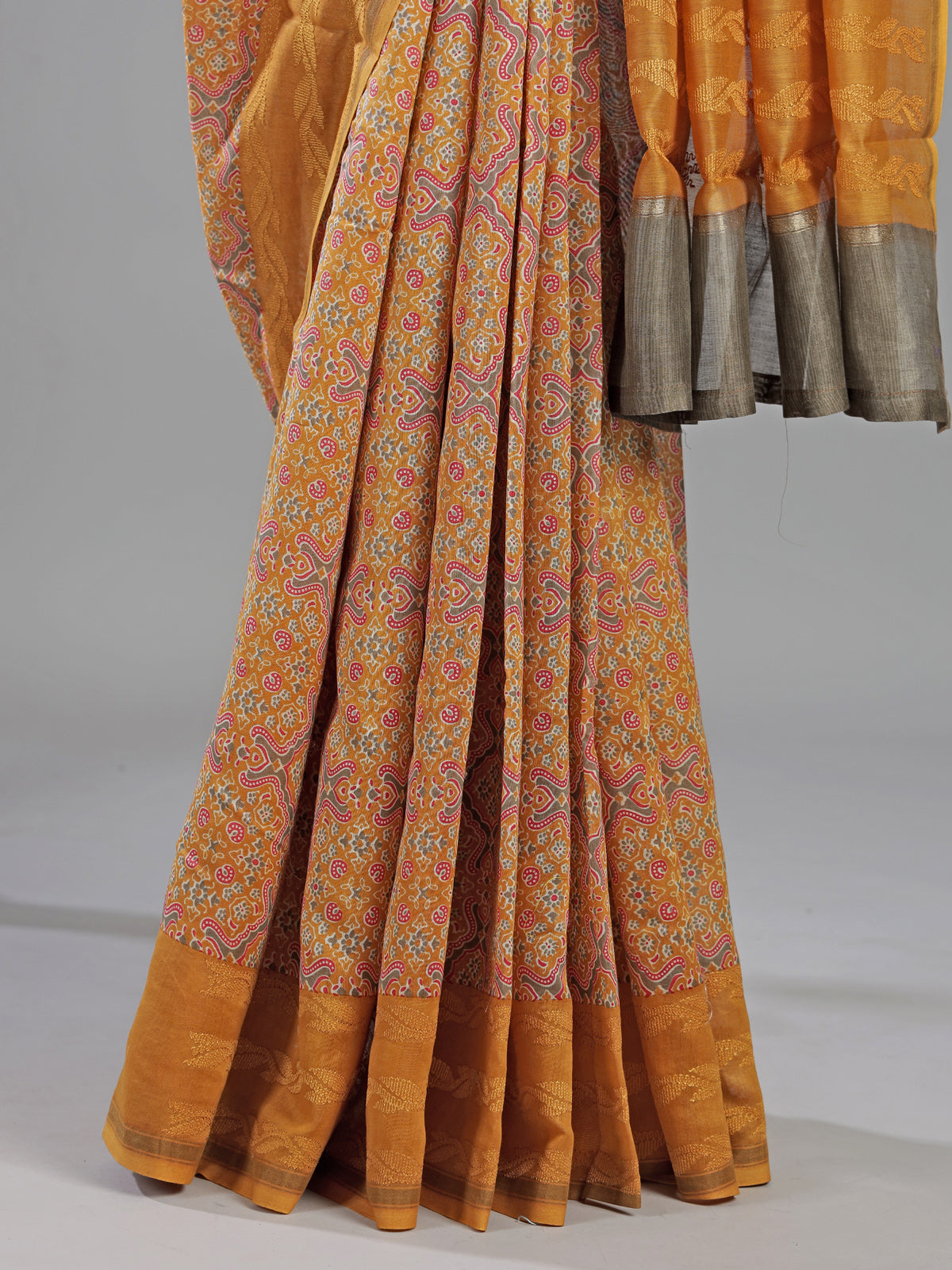 Mustard yellow printed cotton silk saree