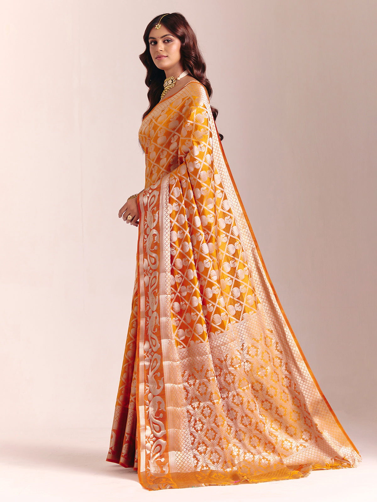 Mustard yellow silk saree with rich zari craftsmanship