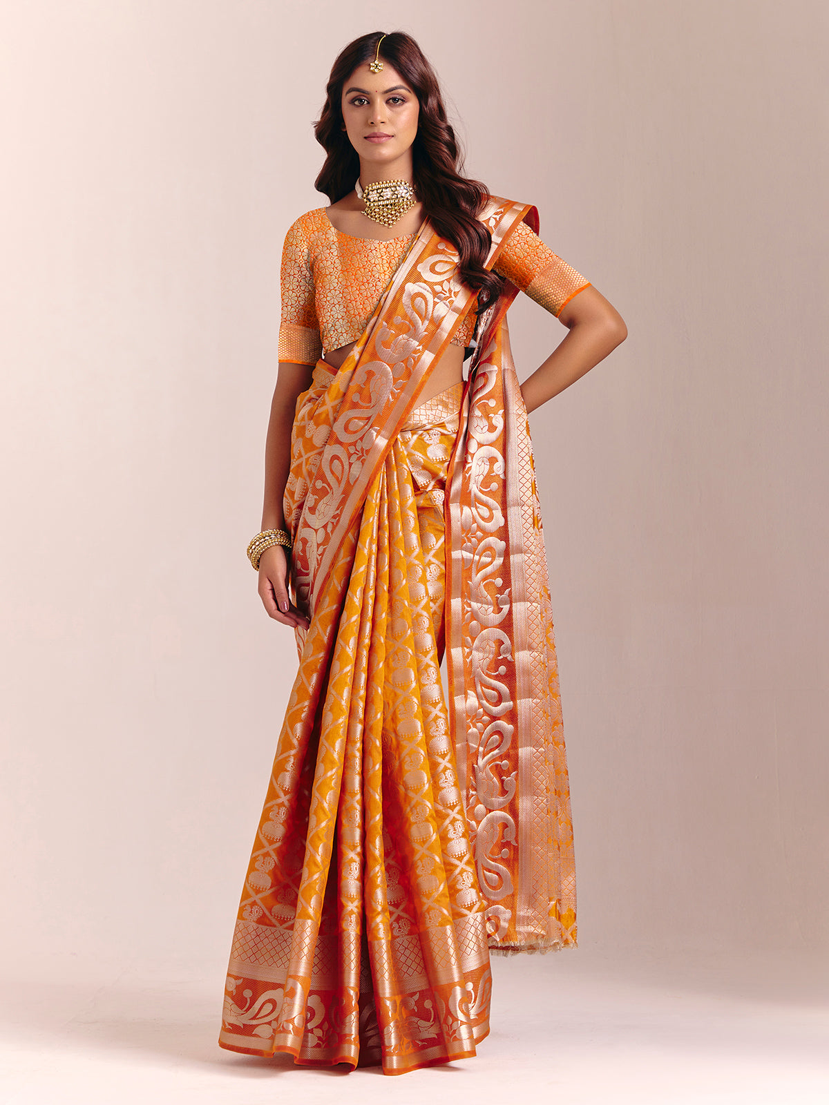 Mustard yellow silk saree with rich zari craftsmanship