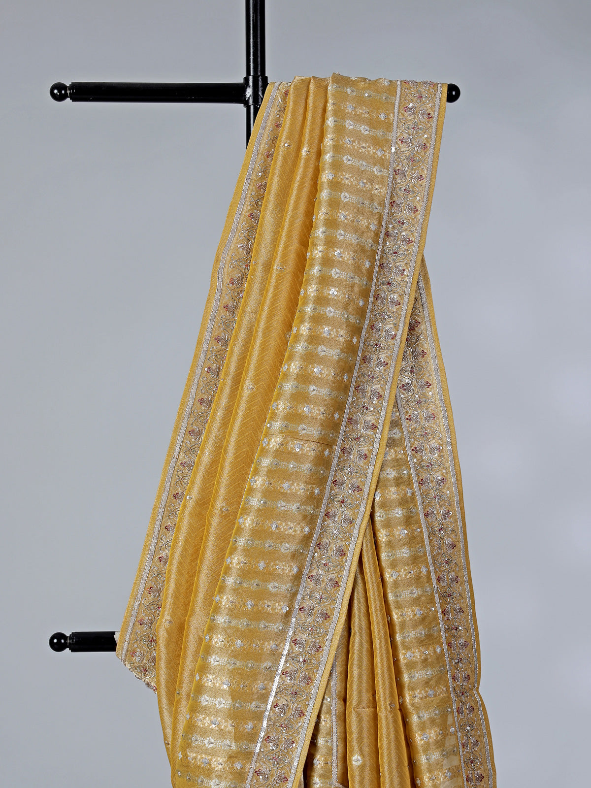 Mustard yellow tissue saree with cutdana work
