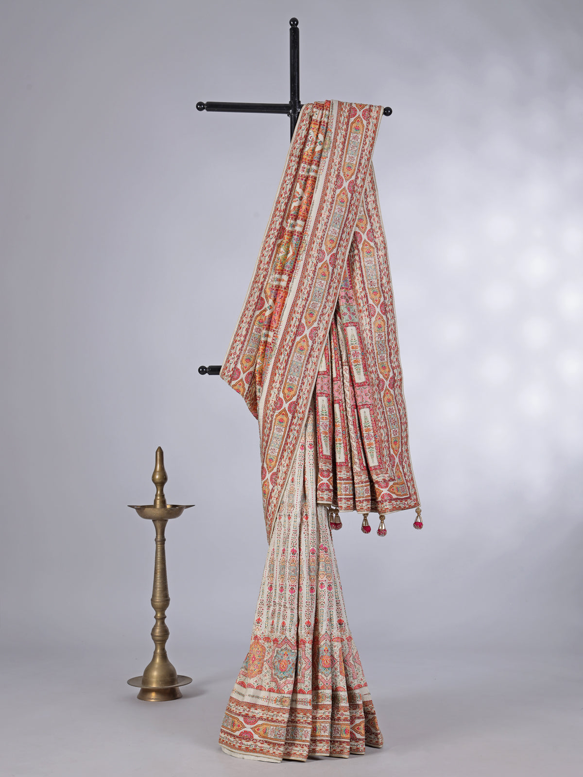Off white art pashmina colorful motif wedding saree