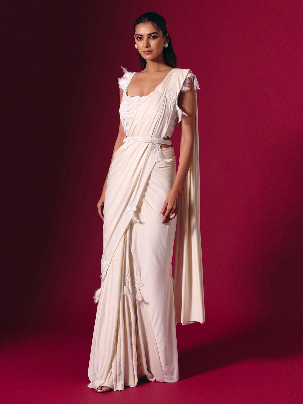 Off white lycra saree with elegant heavy embellishments