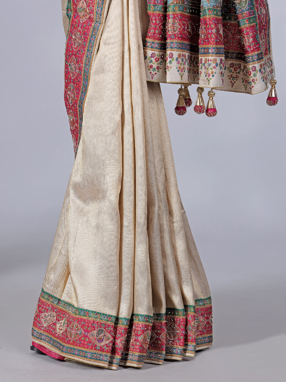 Off white soft tissue silk saree with elegant contrast border