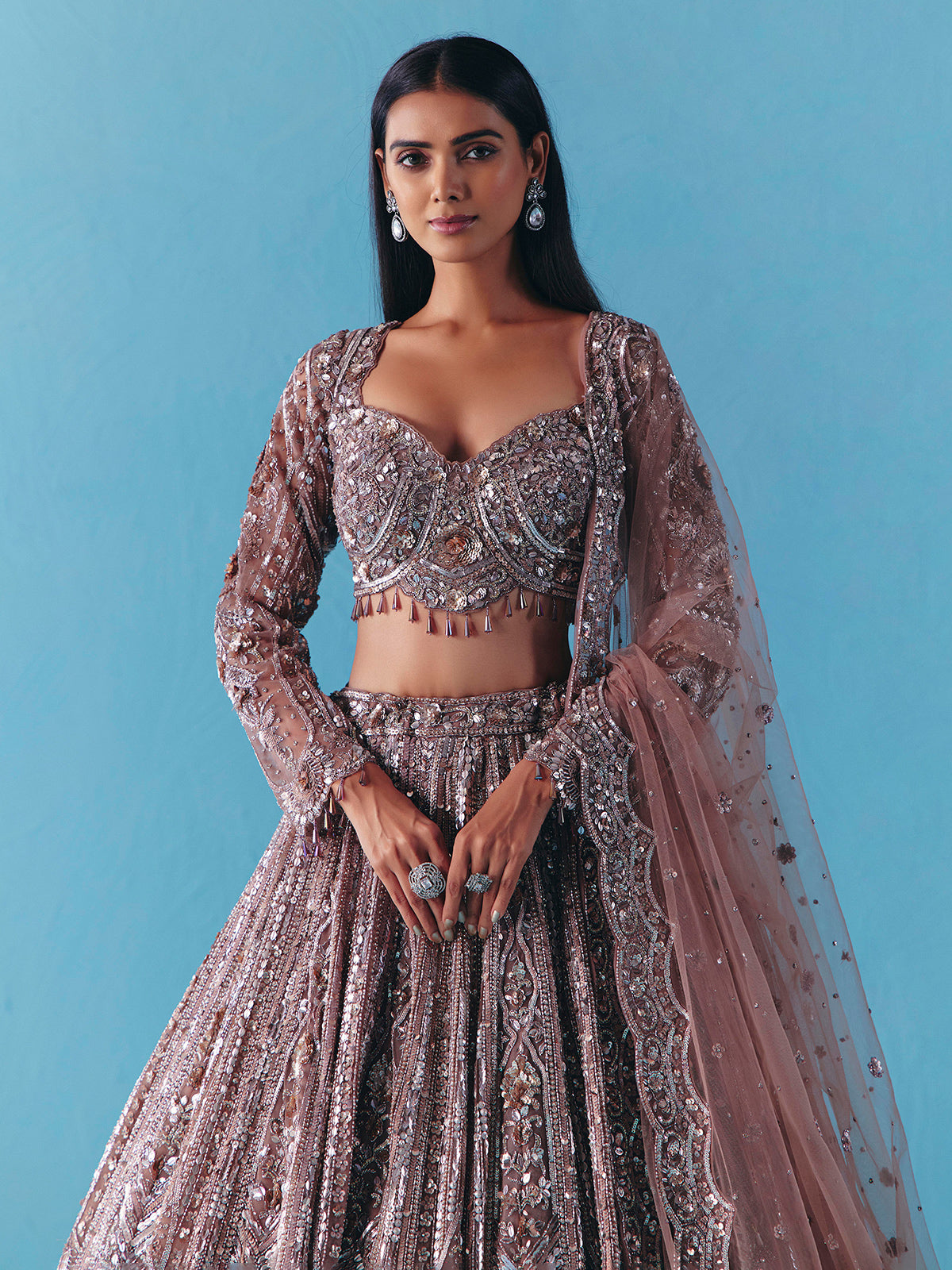 Onion pink net lehenga choli with full sleeve shine