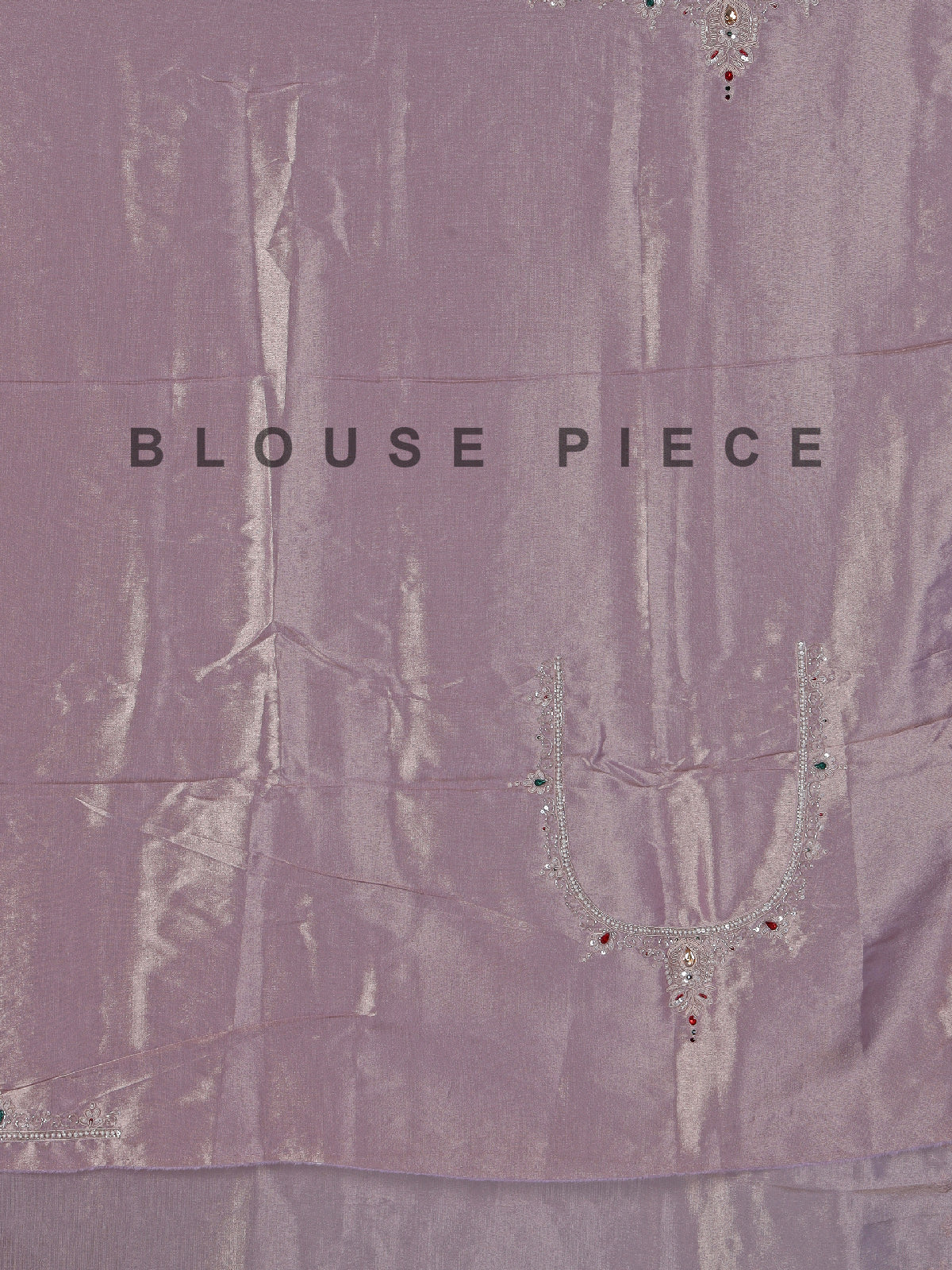 Pastel purple tissue silk saree with stone embellishments