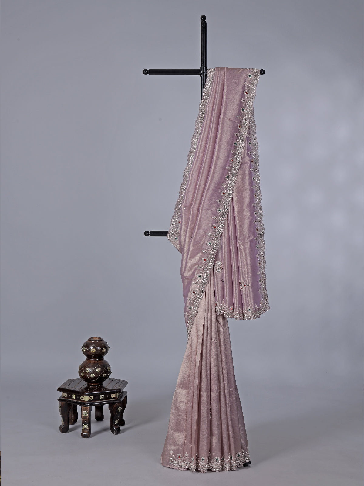 Pastel purple tissue silk saree with stone embellishments