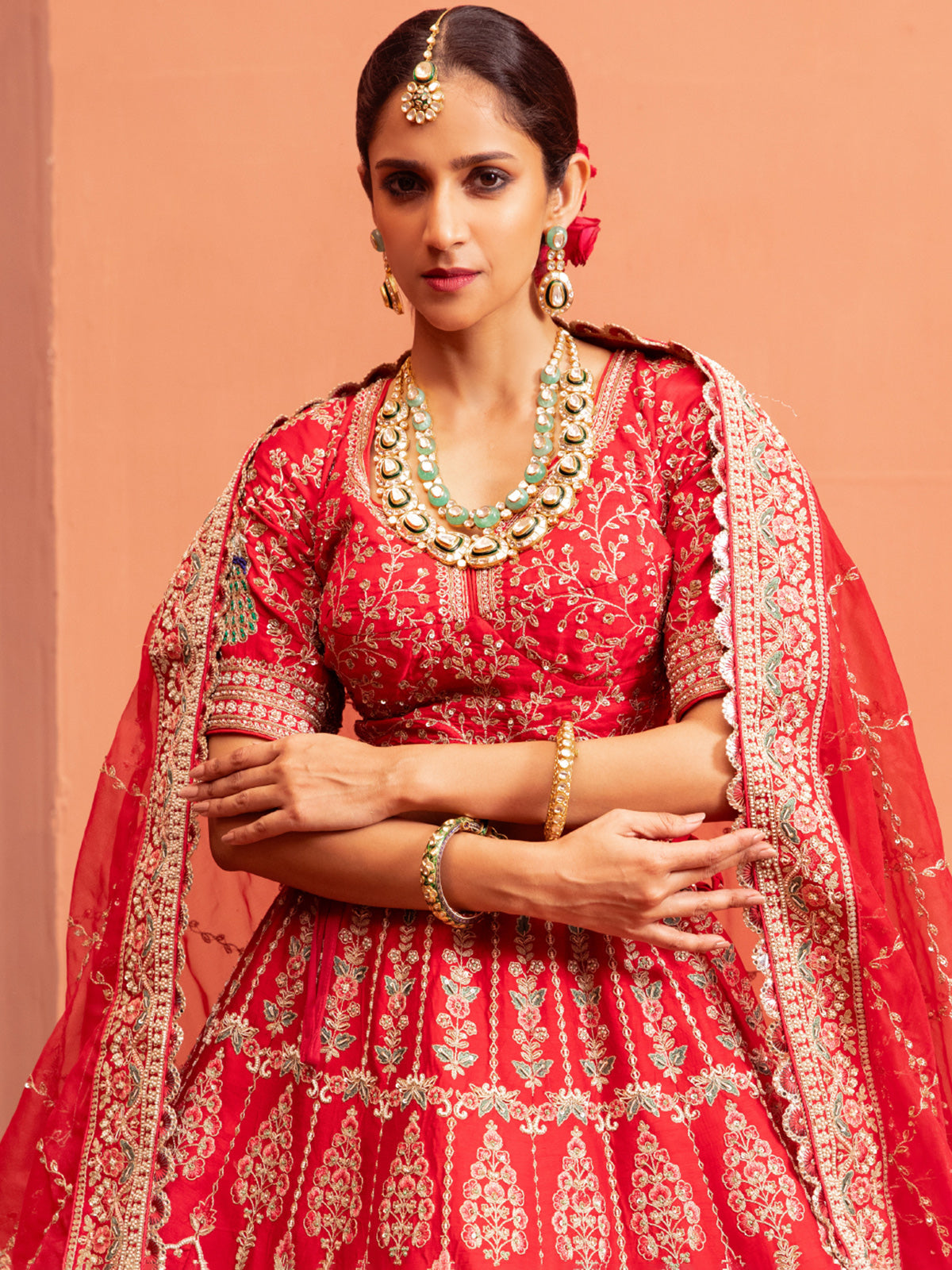 Peach bridal lehenga choli with elbow sleeves