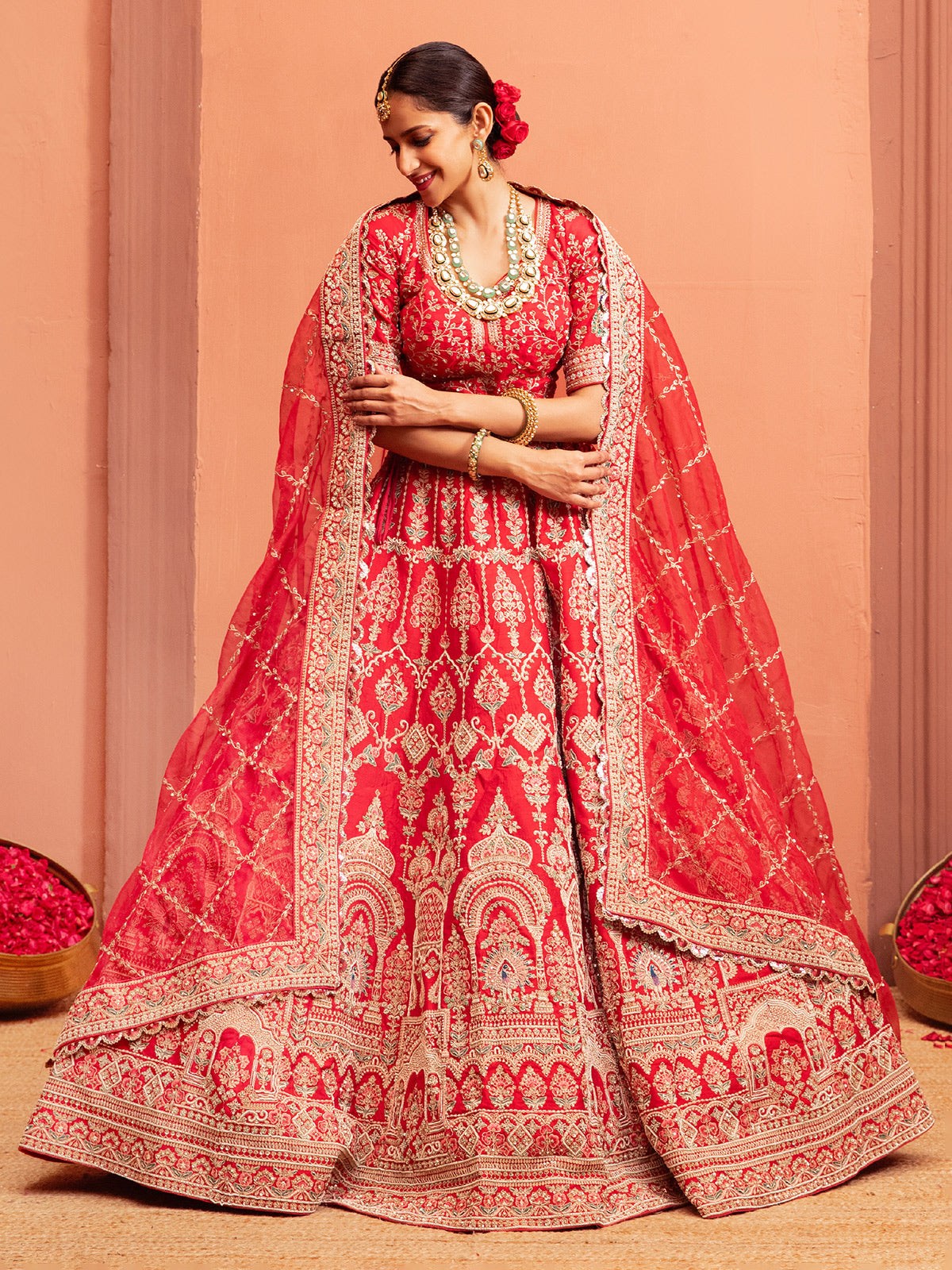 Peach bridal lehenga choli with elbow sleeves