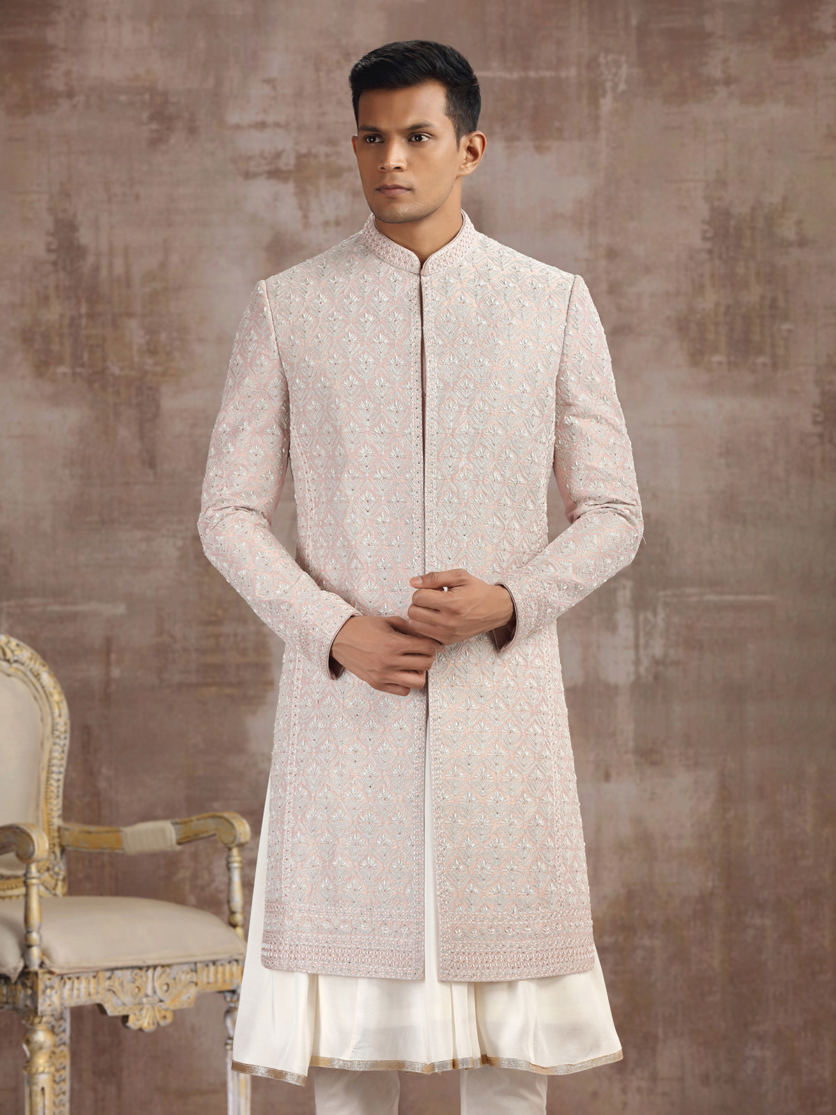Peach silk peshwai sherwani with graceful accents