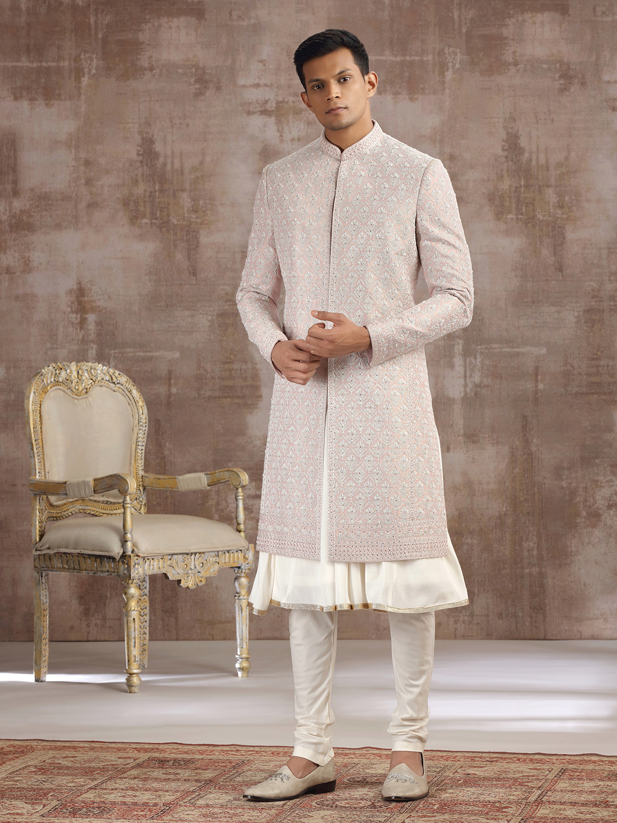 Peach silk peshwai sherwani with graceful accents