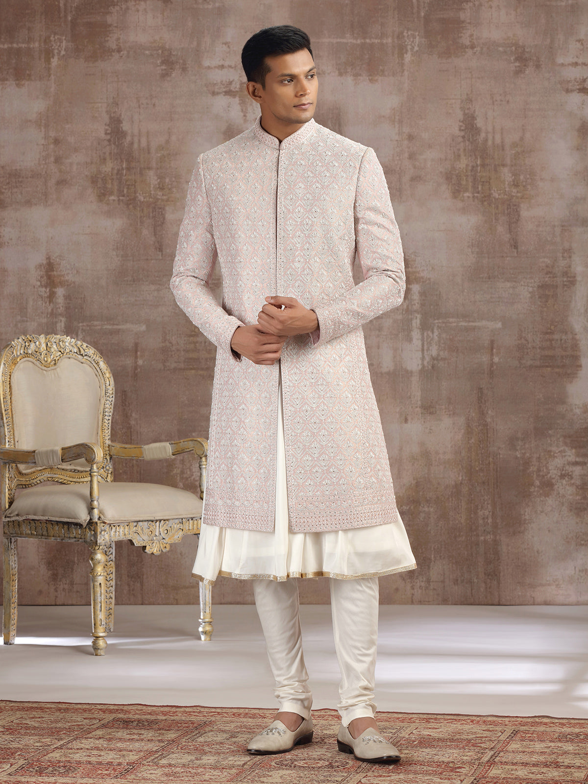 Peach silk peshwai sherwani with graceful accents