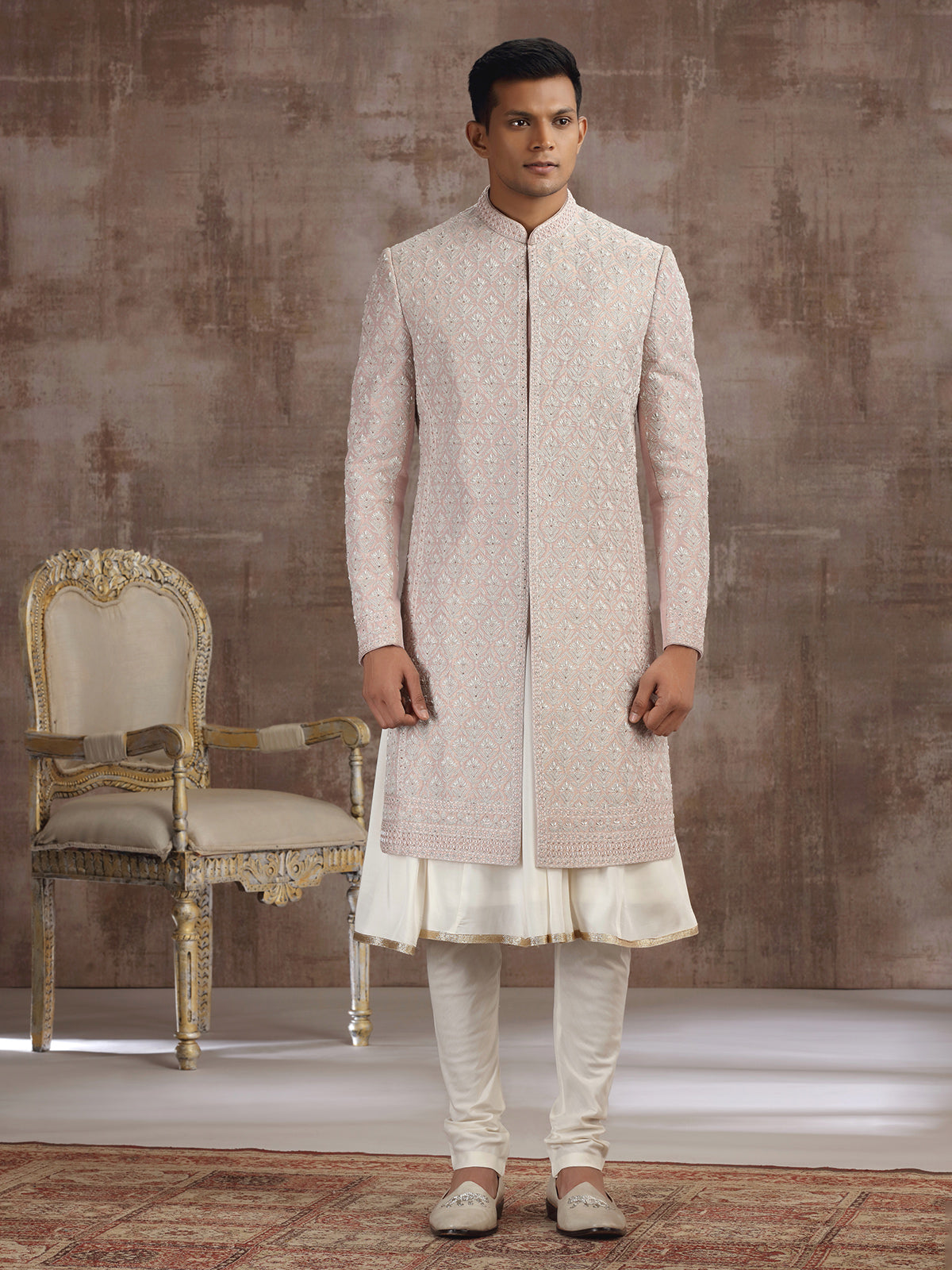 Peach silk peshwai sherwani with graceful accents