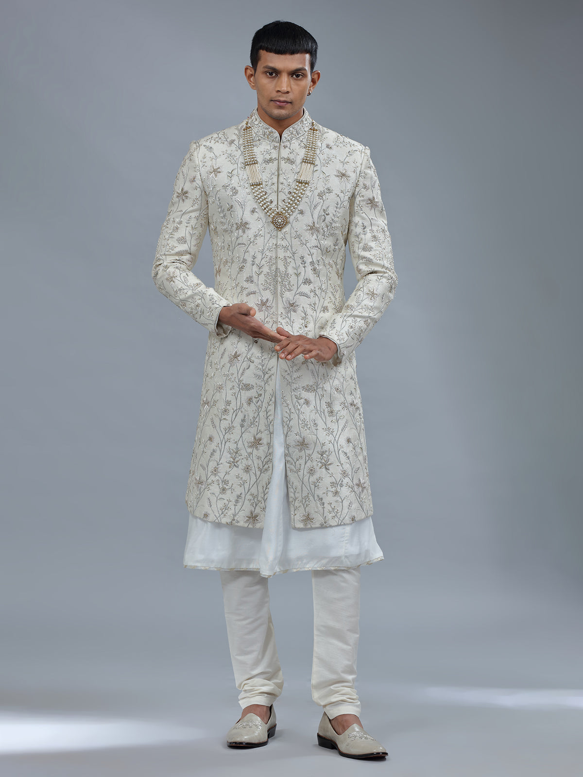 Peshwai style off white raw silk shewani for groom