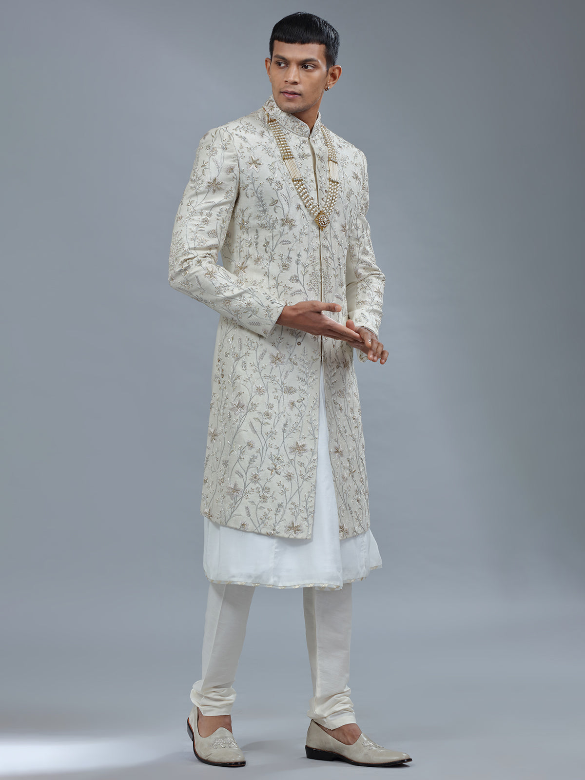 Peshwai style off white raw silk shewani for groom