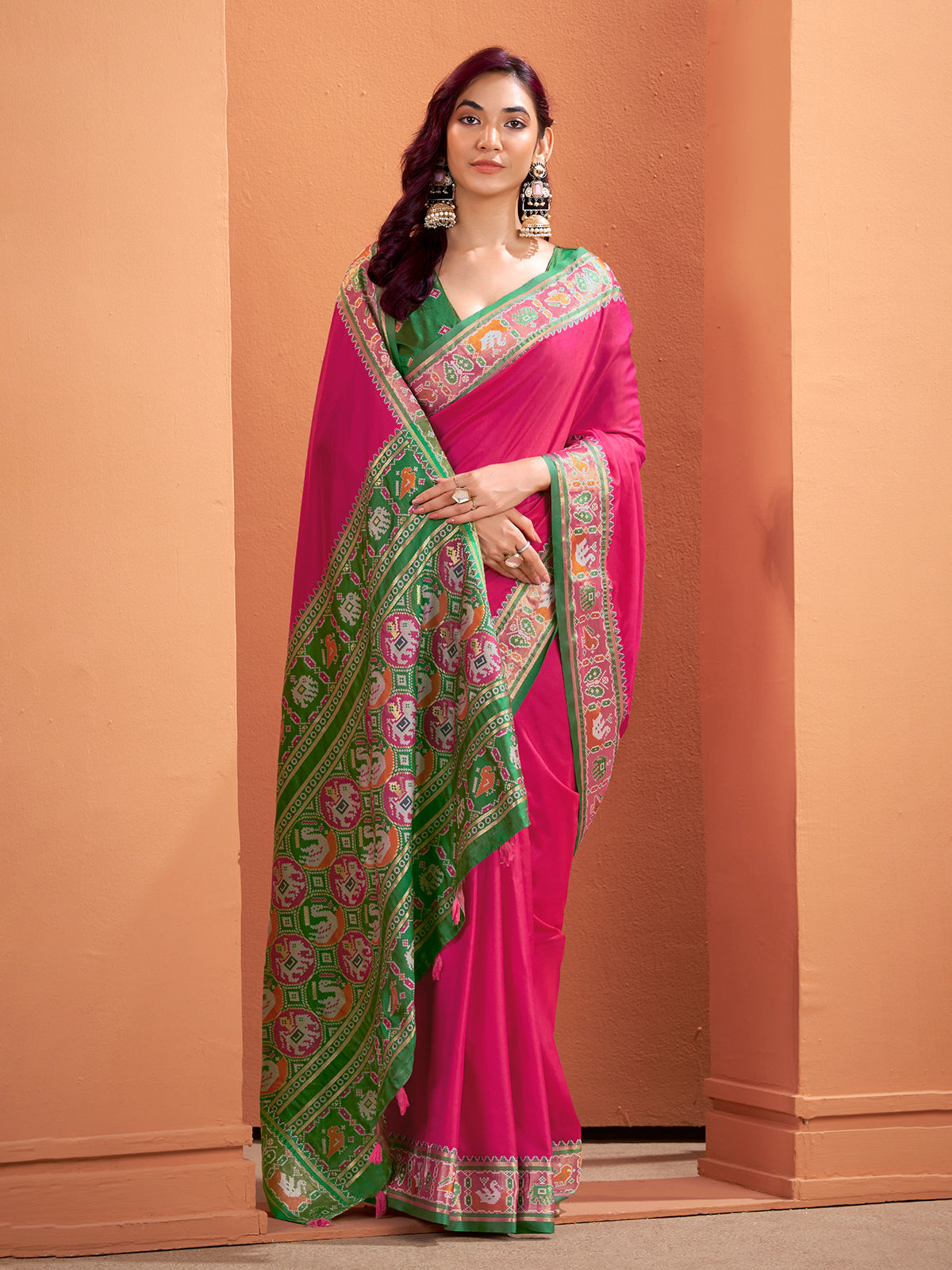 Pink patola silk saree for joyful occasions