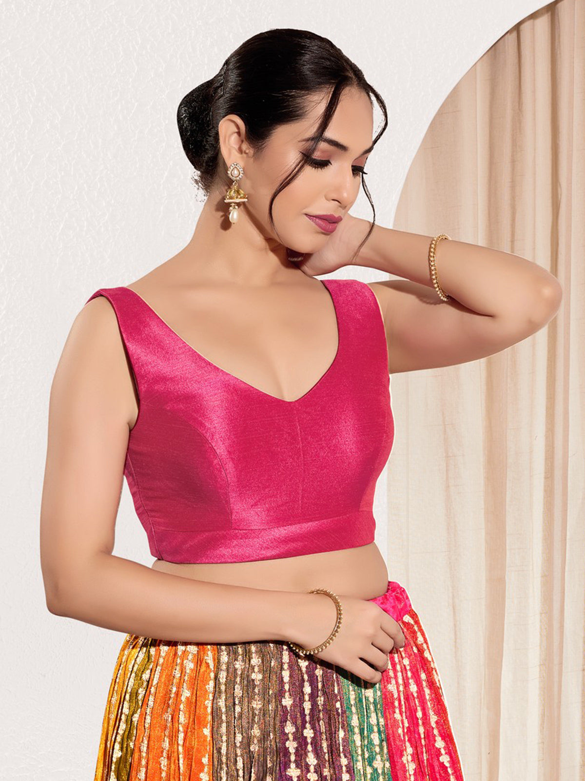 Pink silk round neck sleeveless festive blouse