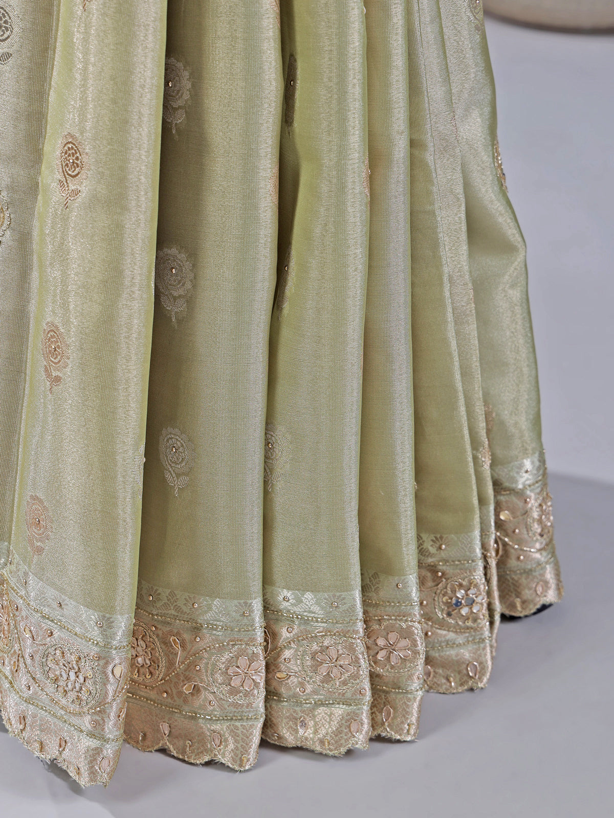 Pista green heavily embellished silk saree for weddings
