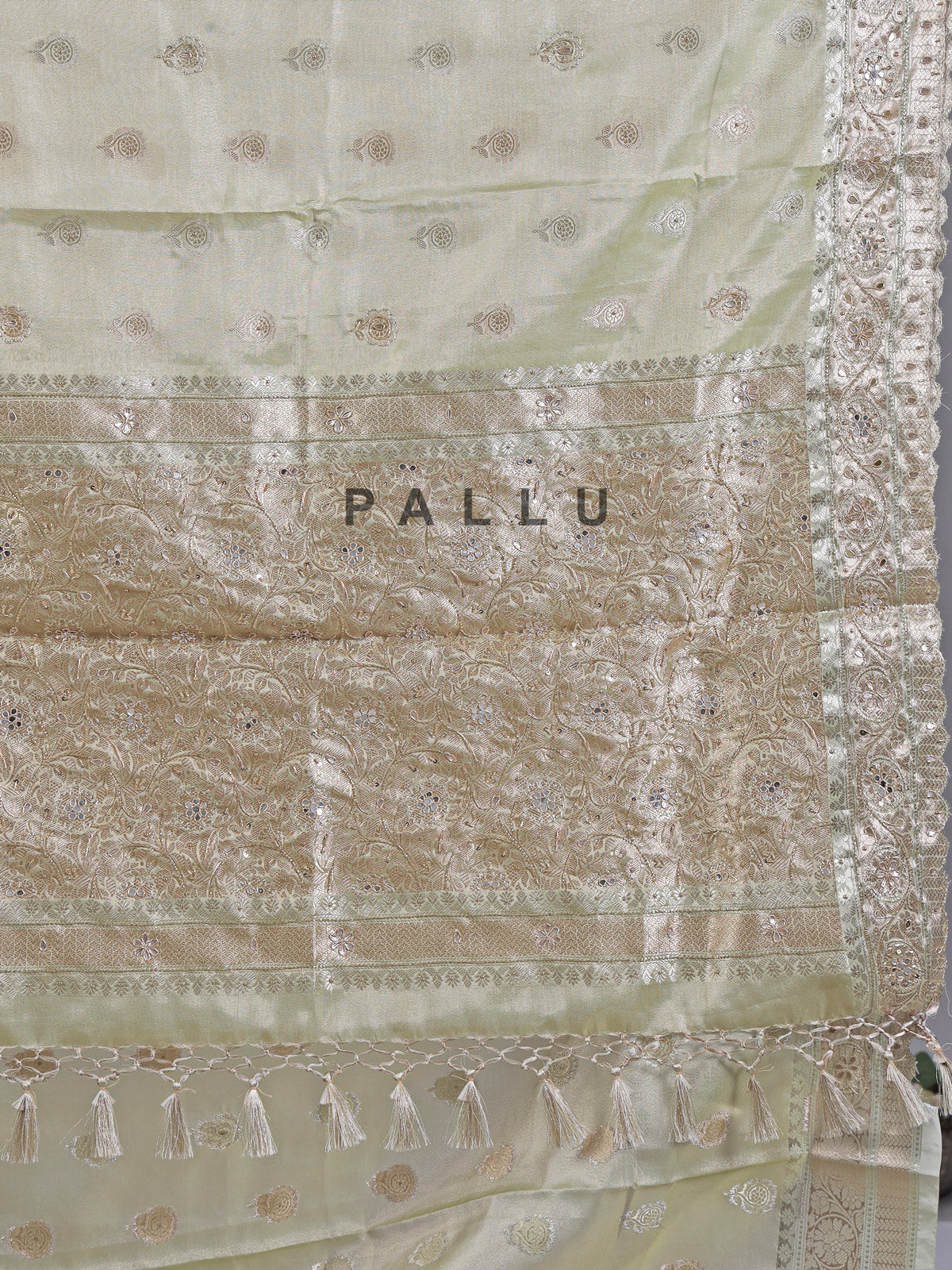 Pista green heavily embellished silk saree for weddings