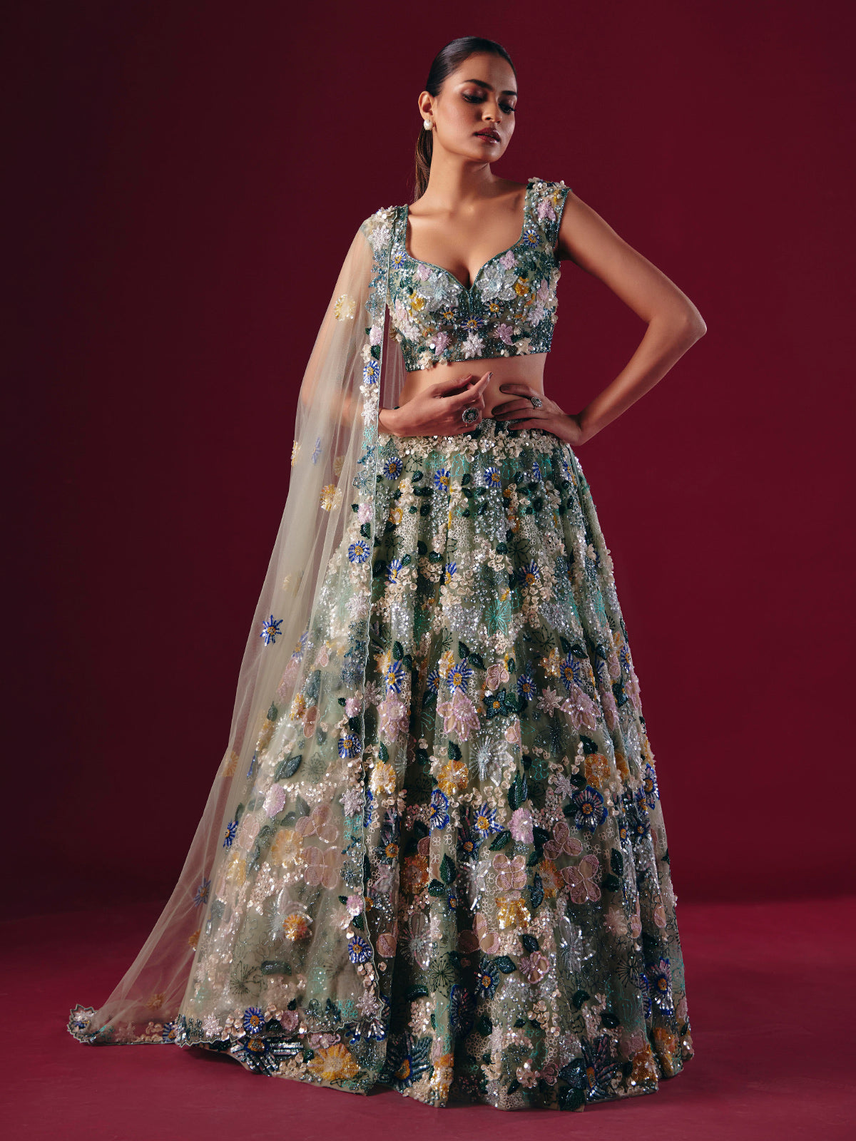 Pista green net lehenga choli with threaded pearl beauty