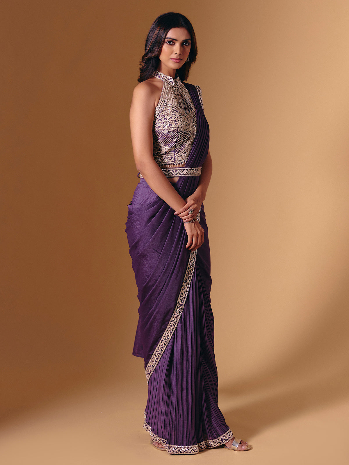 Purple cruss lycra saree with sparkling cutdana detailing