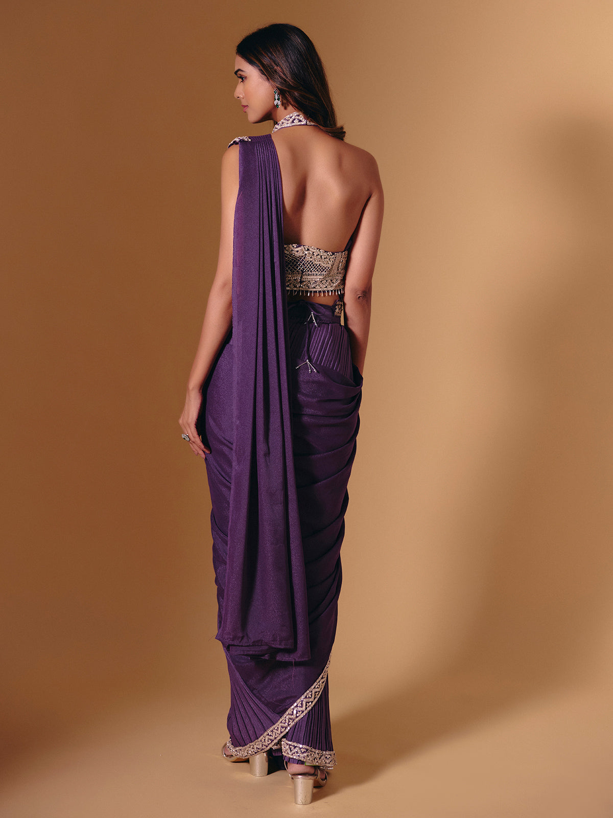 Purple cruss lycra saree with sparkling cutdana detailing