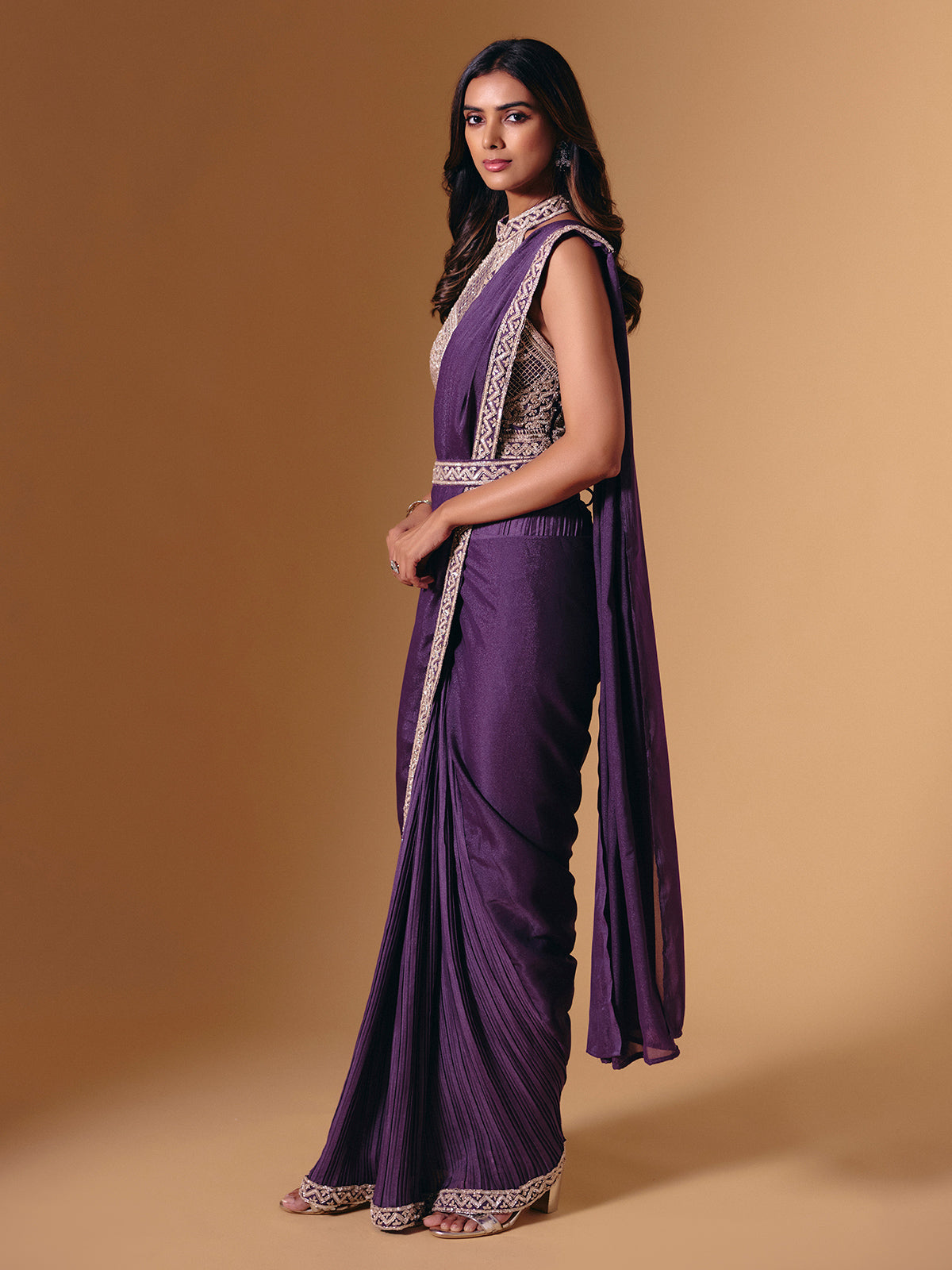 Purple cruss lycra saree with sparkling cutdana detailing