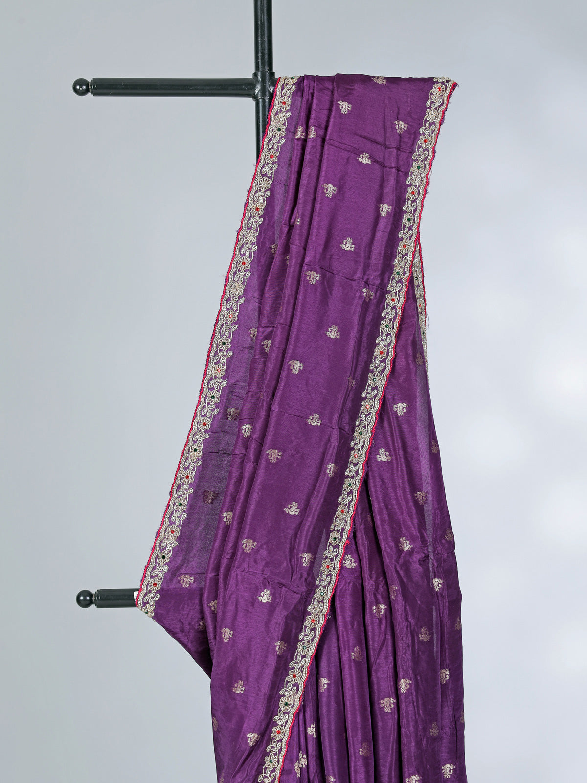 Purple dola silk saree with bold pink blouse