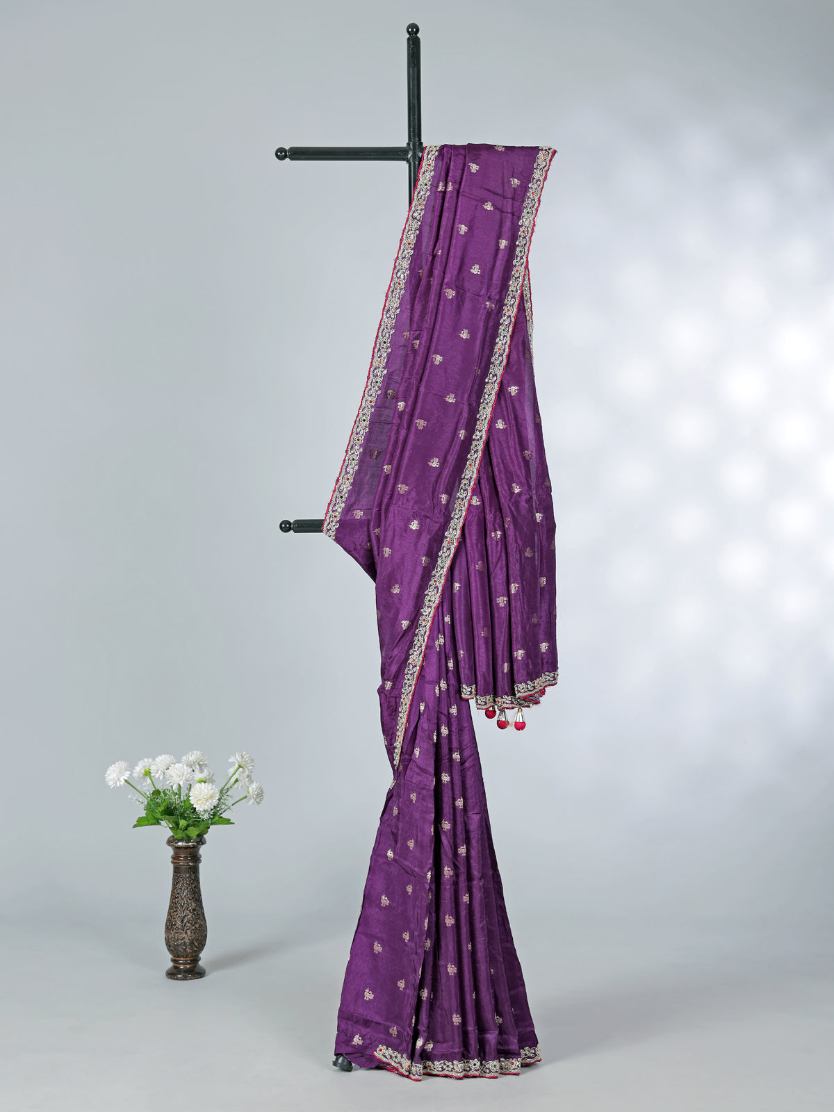 Purple dola silk saree with bold pink blouse