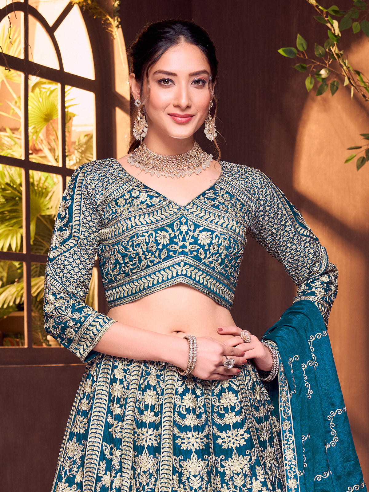 Rama blue silk quarter sleeve wedding wear lehenga choli
