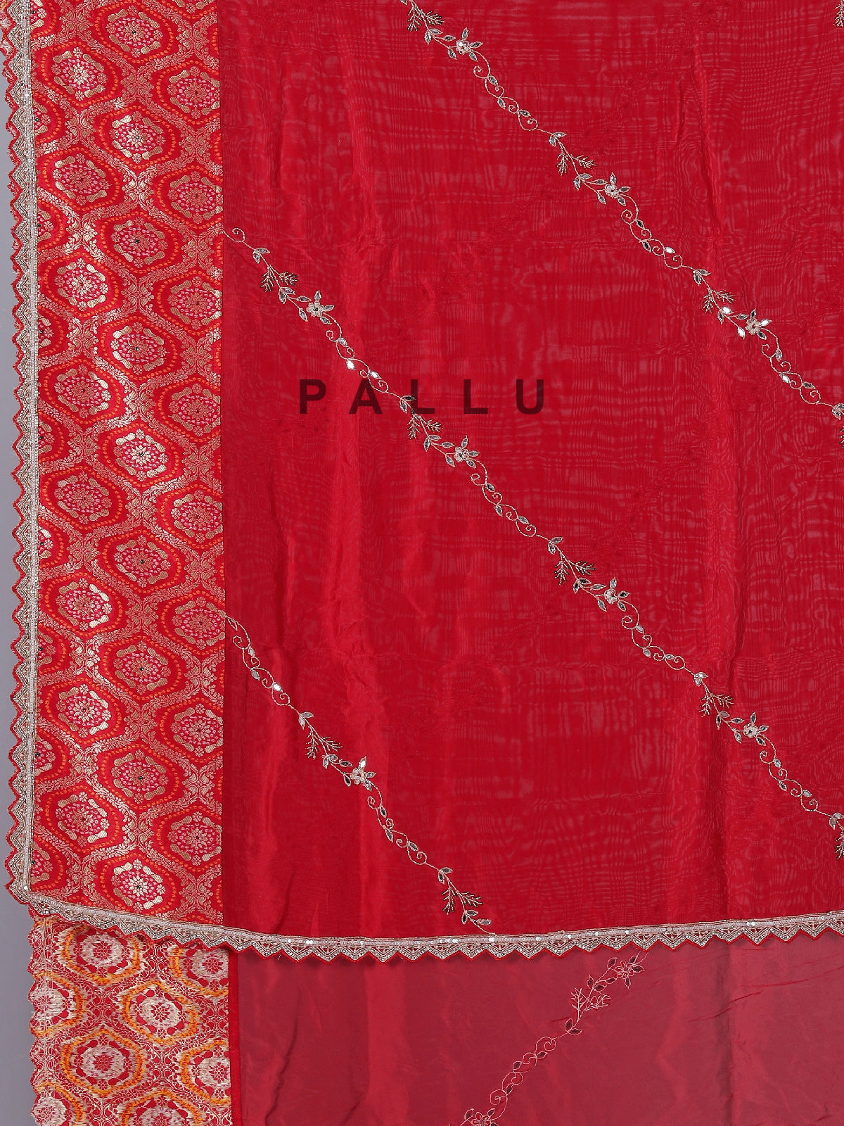 Red dola silk saree with sparkling festive embellishments
