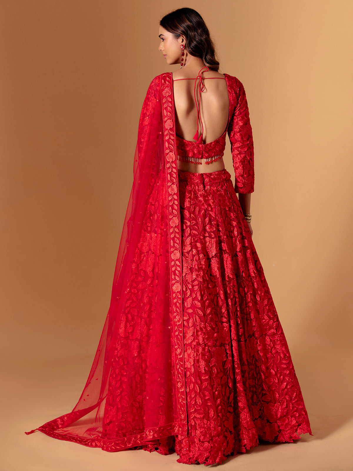 Red net embroidered lehenga choli for wedding wear