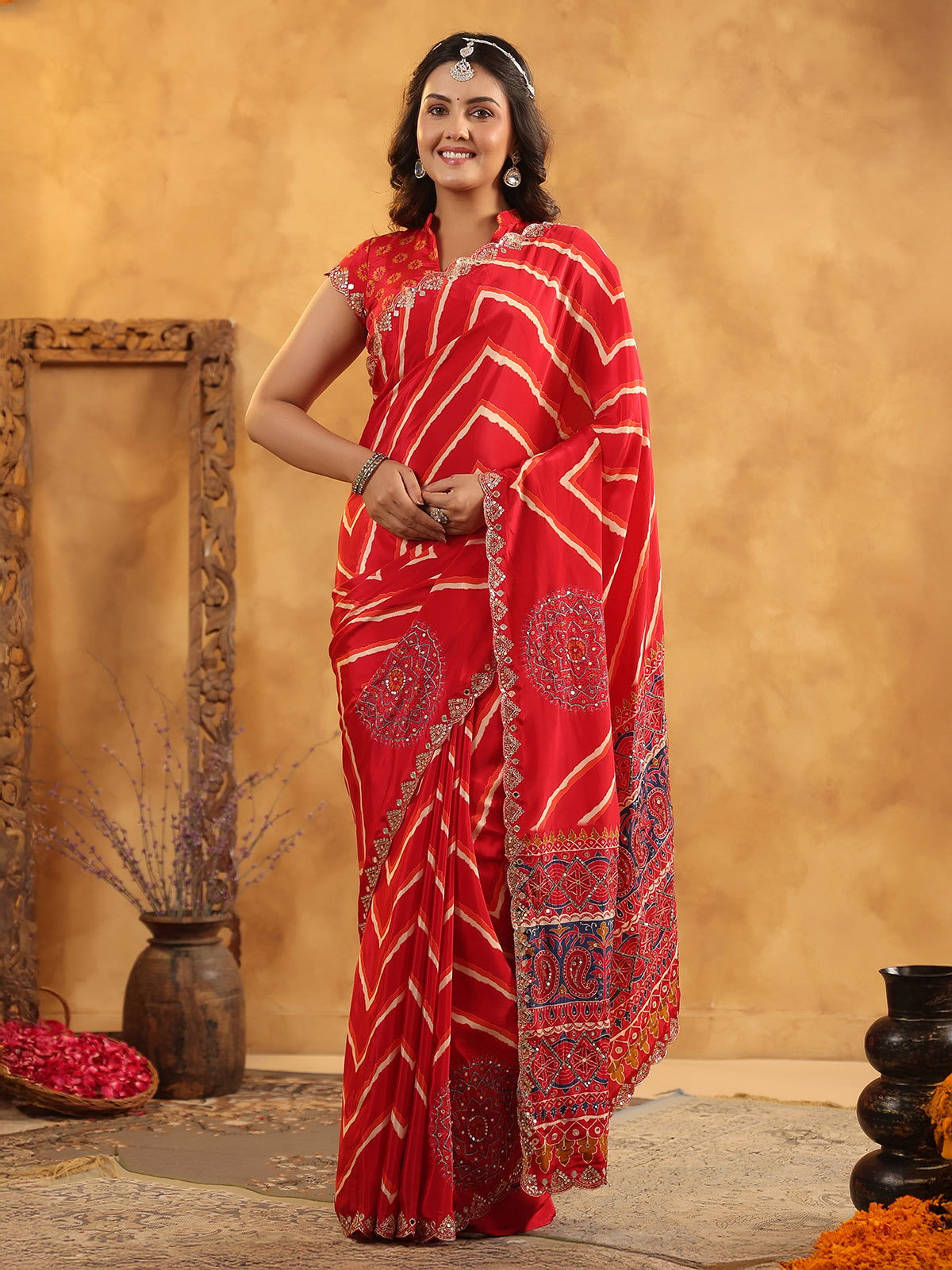Red printed silk saree with aabla and resham work