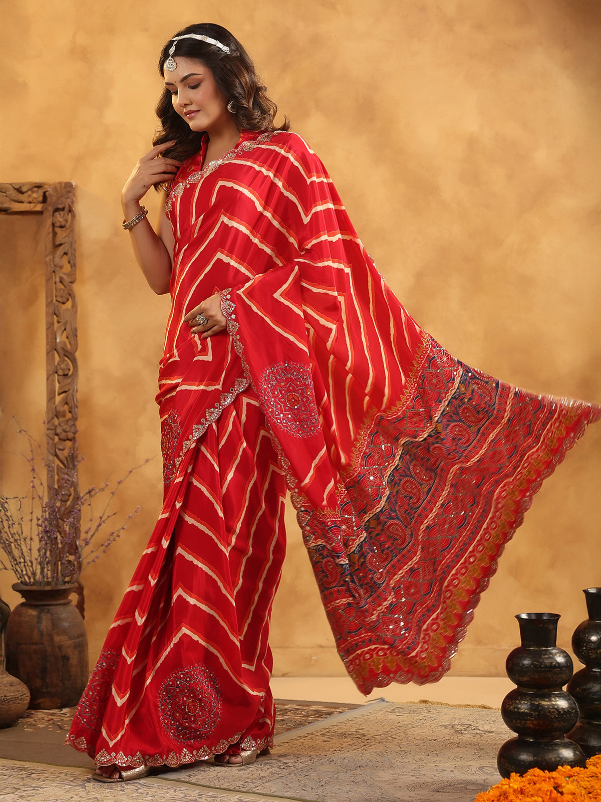 Red printed silk saree with aabla and resham work