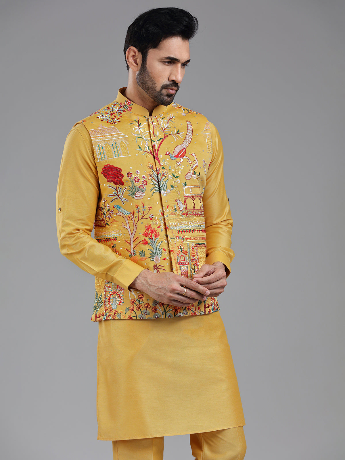 Shiny yellow multi coloured embroiderired kurta jacket set
