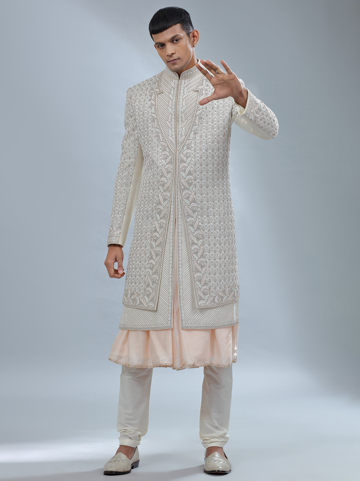 Stunning Off white and peach silk peshwai sherwani