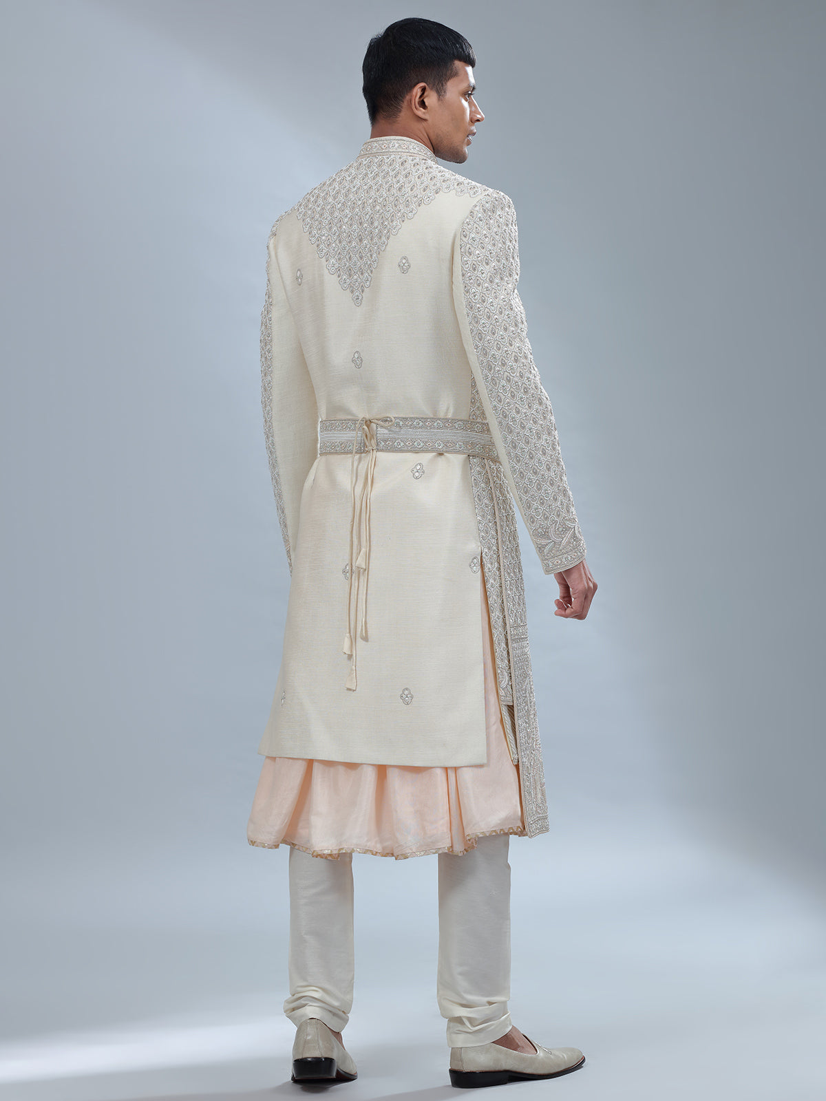 Stunning Off white and peach silk peshwai sherwani