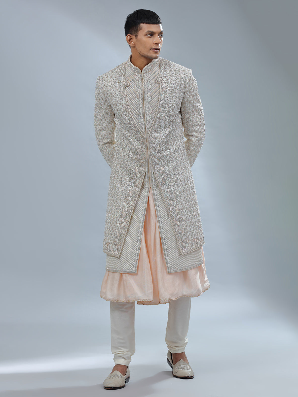 Stunning Off white and peach silk peshwai sherwani