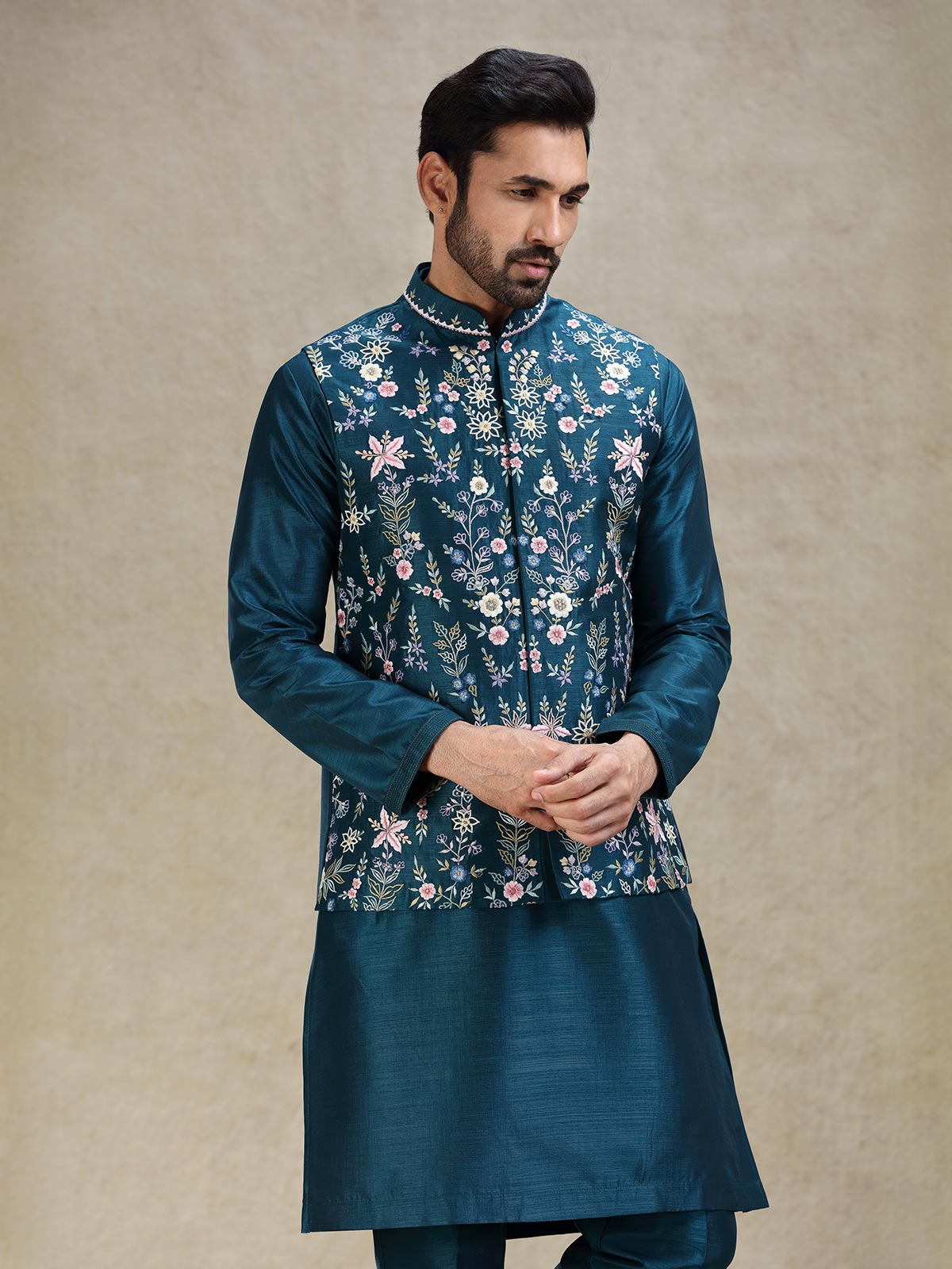 Teal blue beautifully embroidered silk kurta jacket set