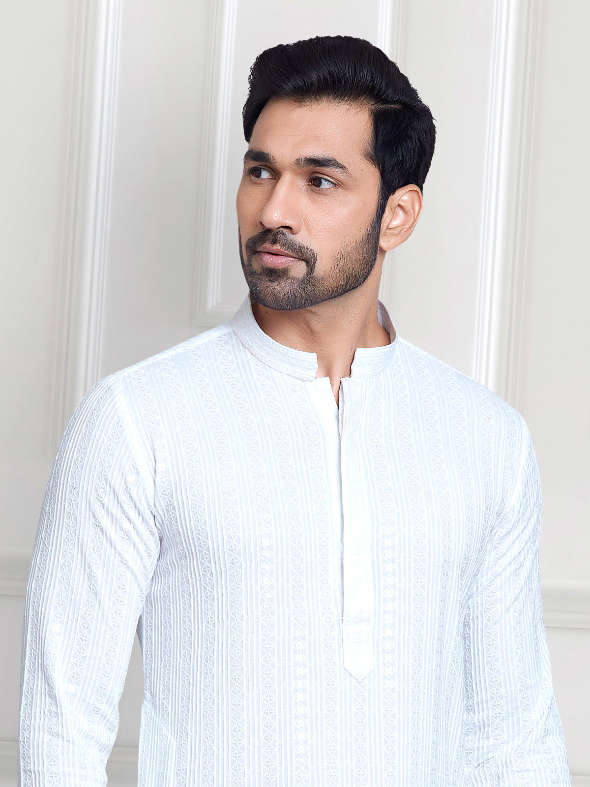 Trendy white embroidery kurta suit for festive