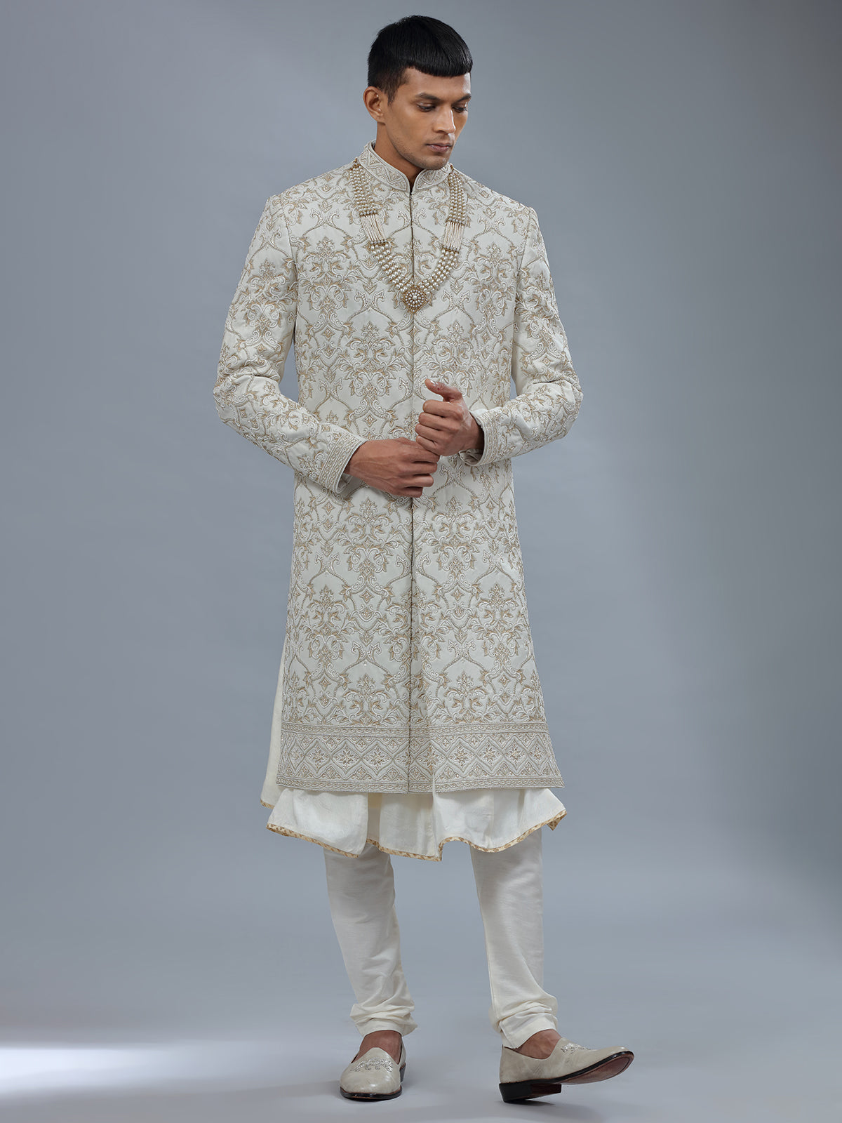 White peshwai silk shewani for groomsman