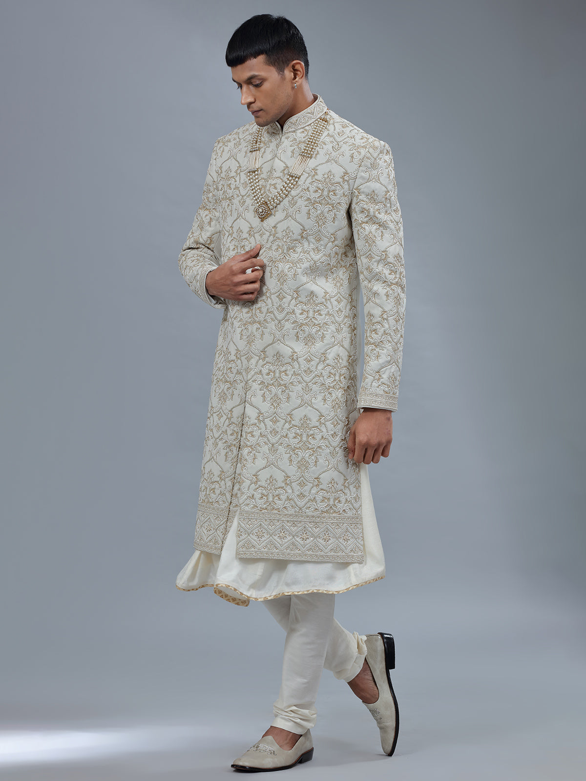 White peshwai silk shewani for groomsman