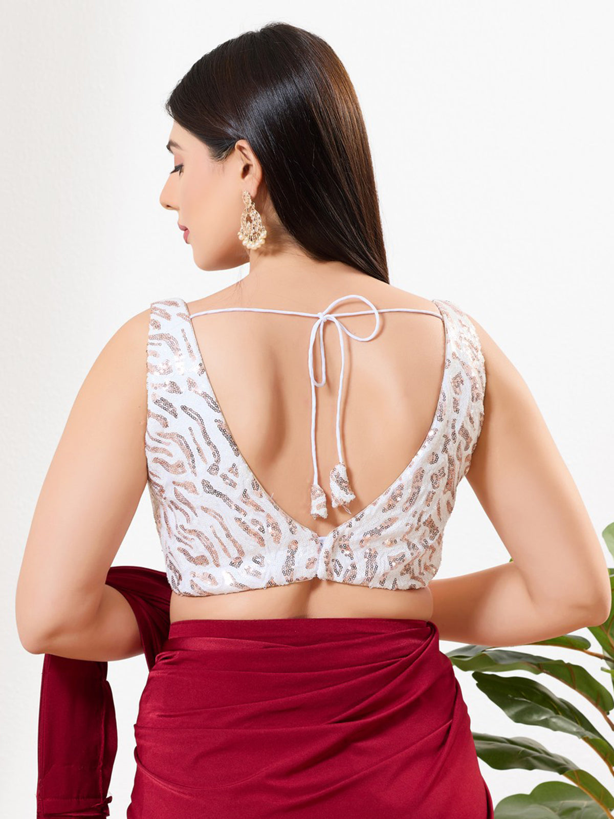 White sequins sleeveless V neck party wear blouse